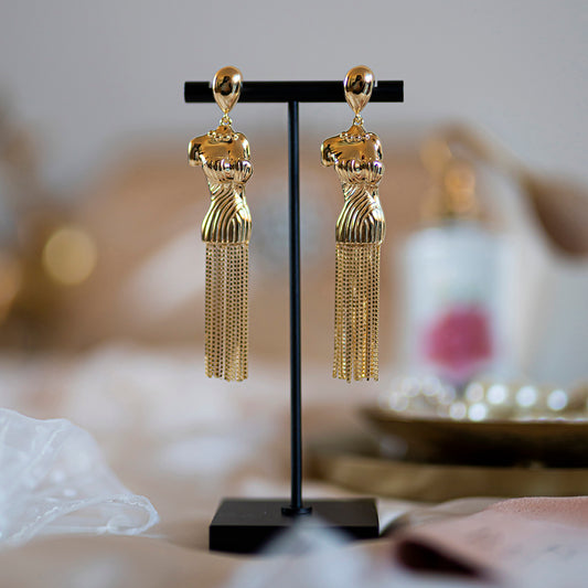 Rhea - stud oorbellen met sliertjes in goud - set